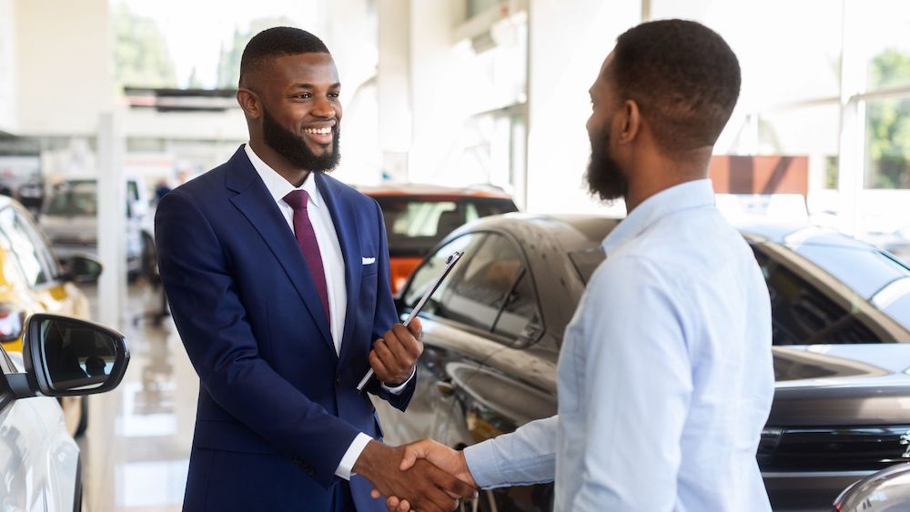 Car salesman closes deal with handshake | Increased Efficiency | Linkpoint360